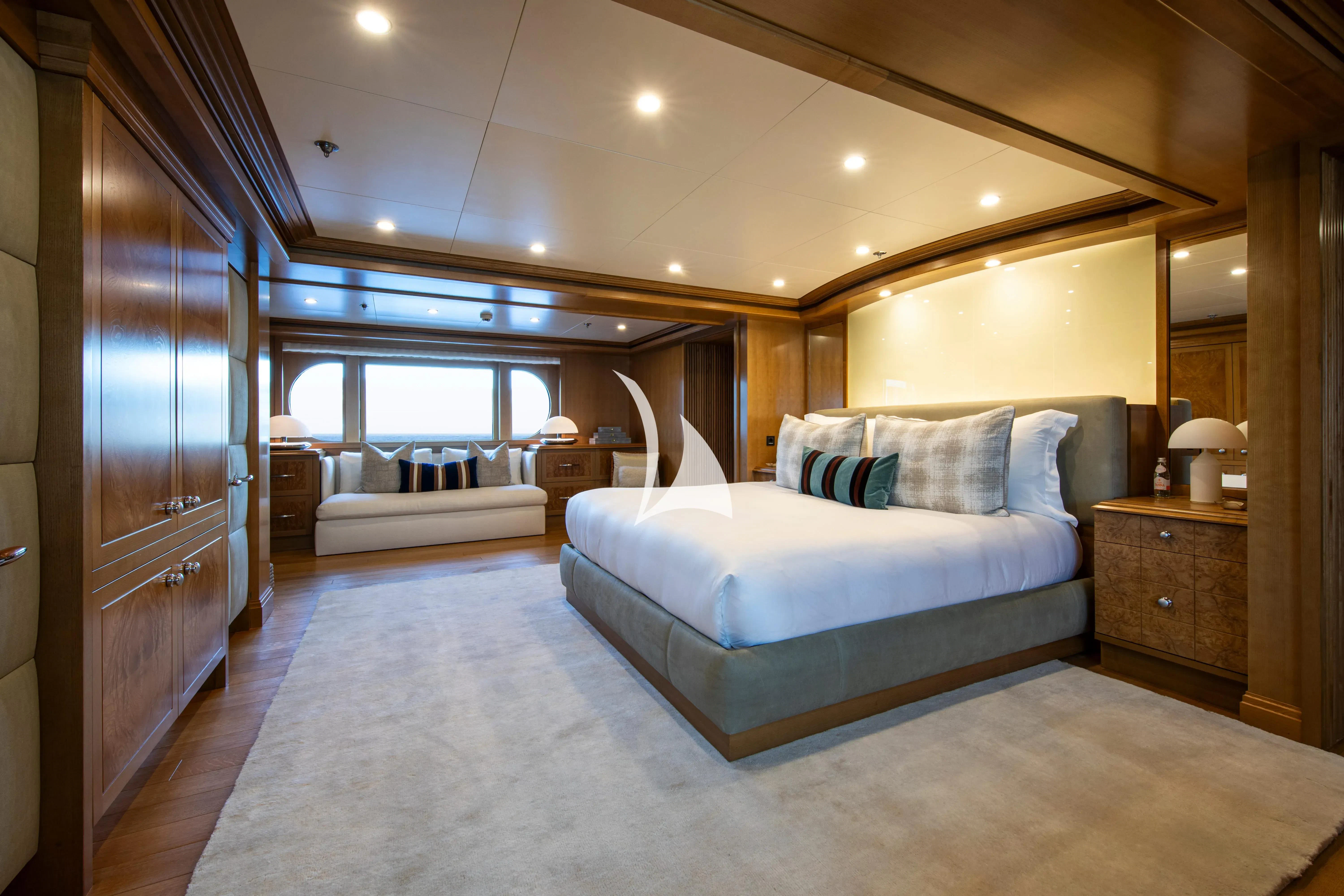 a large bedroom with a large bed aboard TREEHOUSE Yacht for Sale