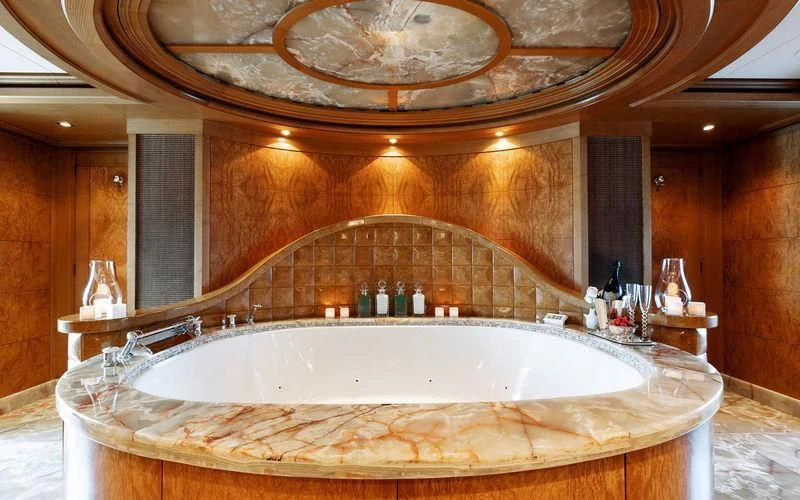 a large bathroom with a large bathtub aboard TREEHOUSE Yacht for Sale