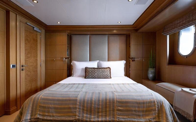 a bed in a room aboard TREEHOUSE Yacht for Sale