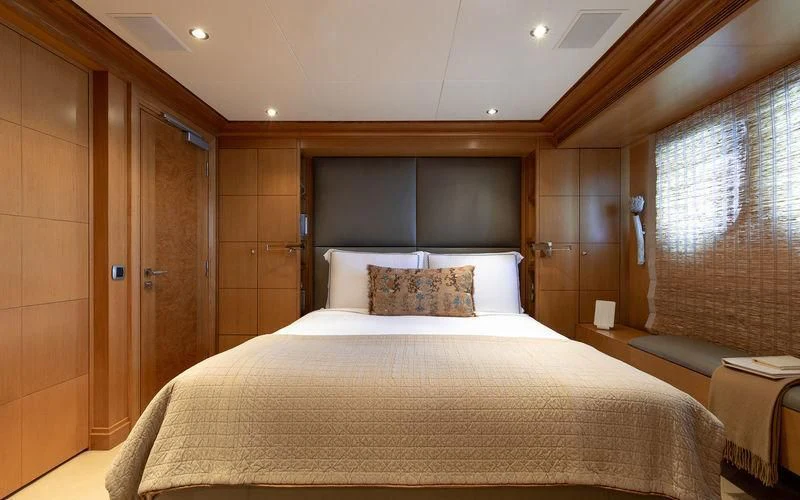 a bed in a room aboard TREEHOUSE Yacht for Sale