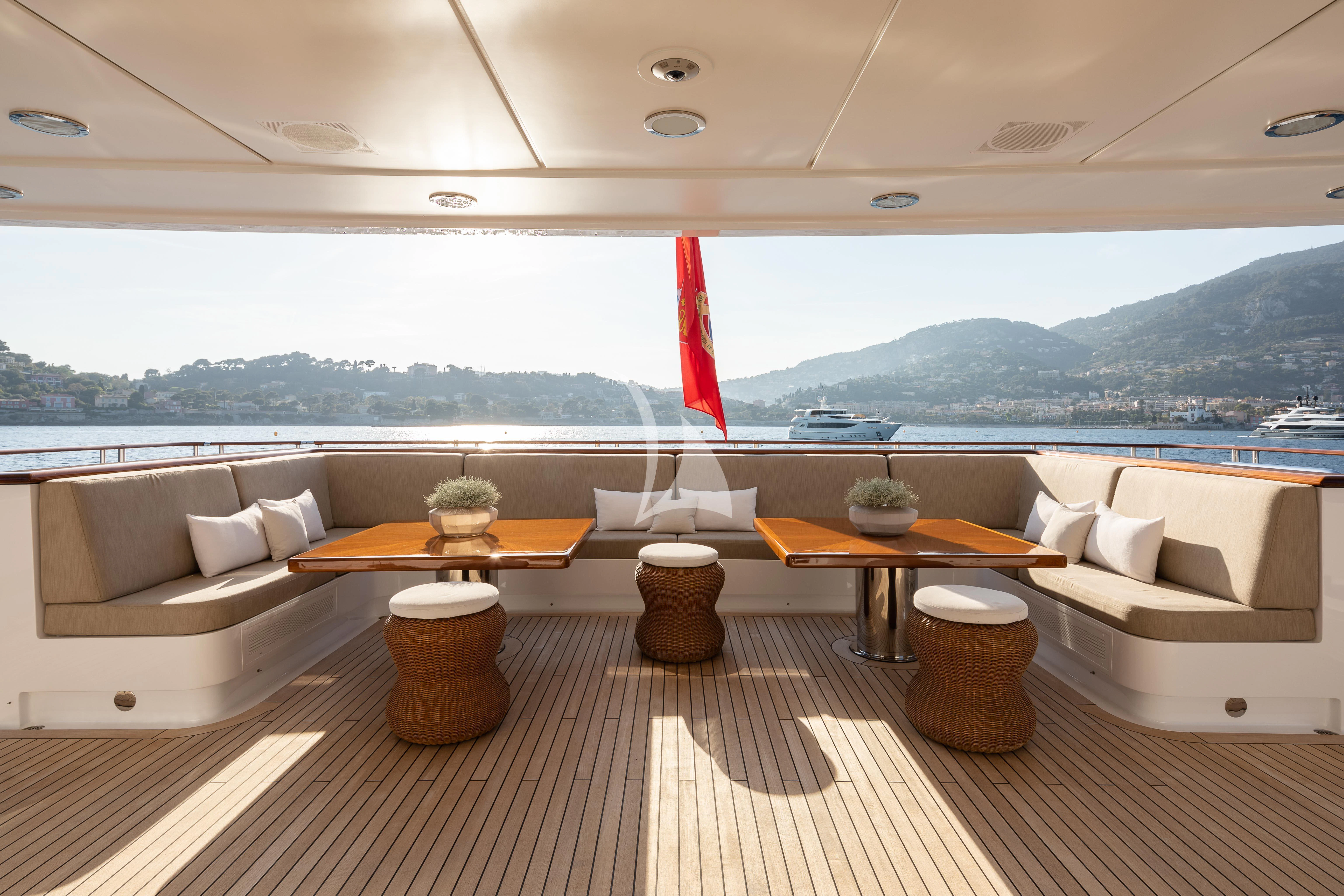 a room with a table and chairs aboard TREEHOUSE Yacht for Sale