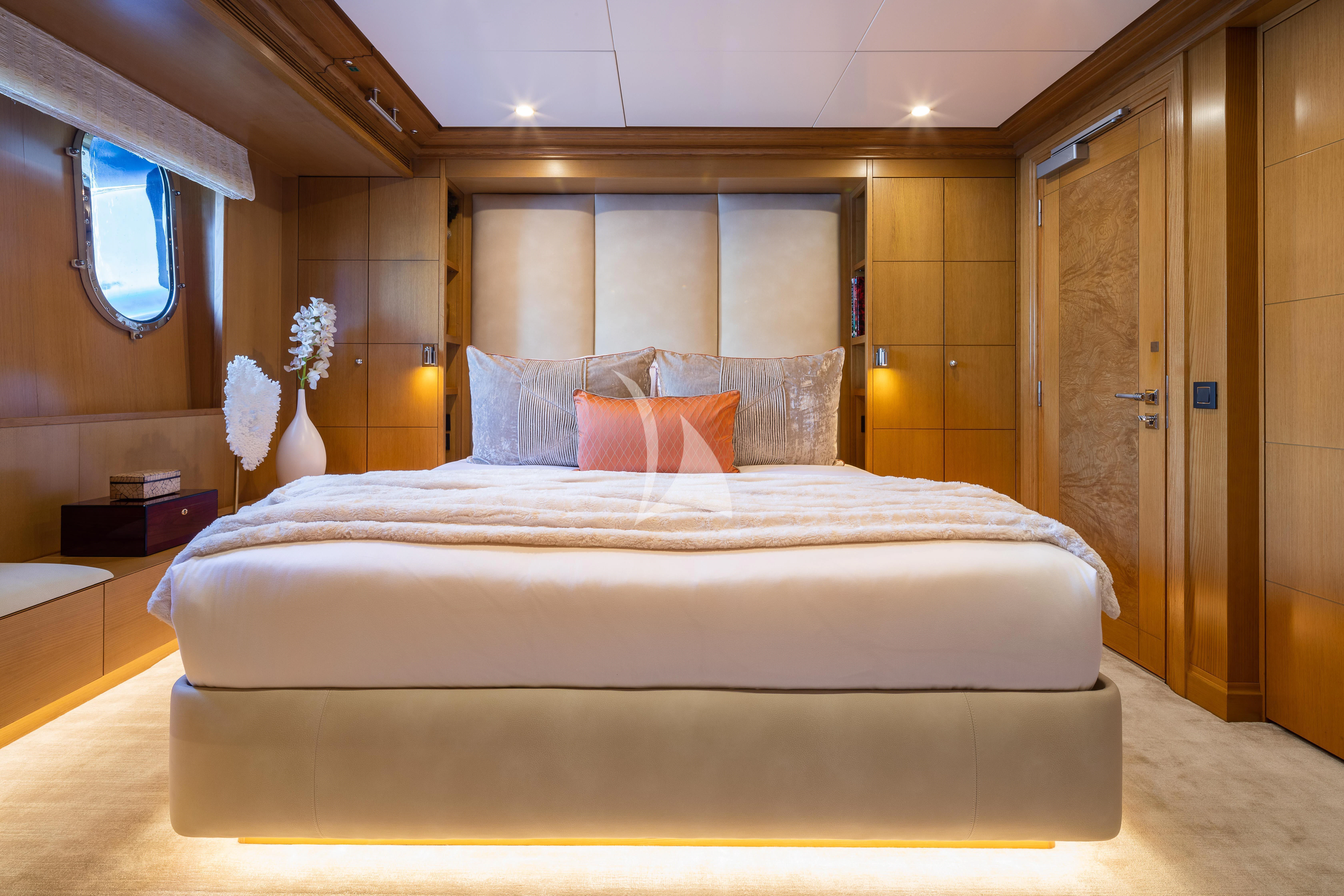 a bed in a room aboard TREEHOUSE Yacht for Sale