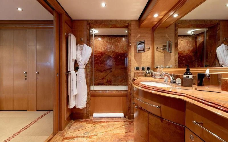 a bathroom with a large mirror aboard TREEHOUSE Yacht for Sale