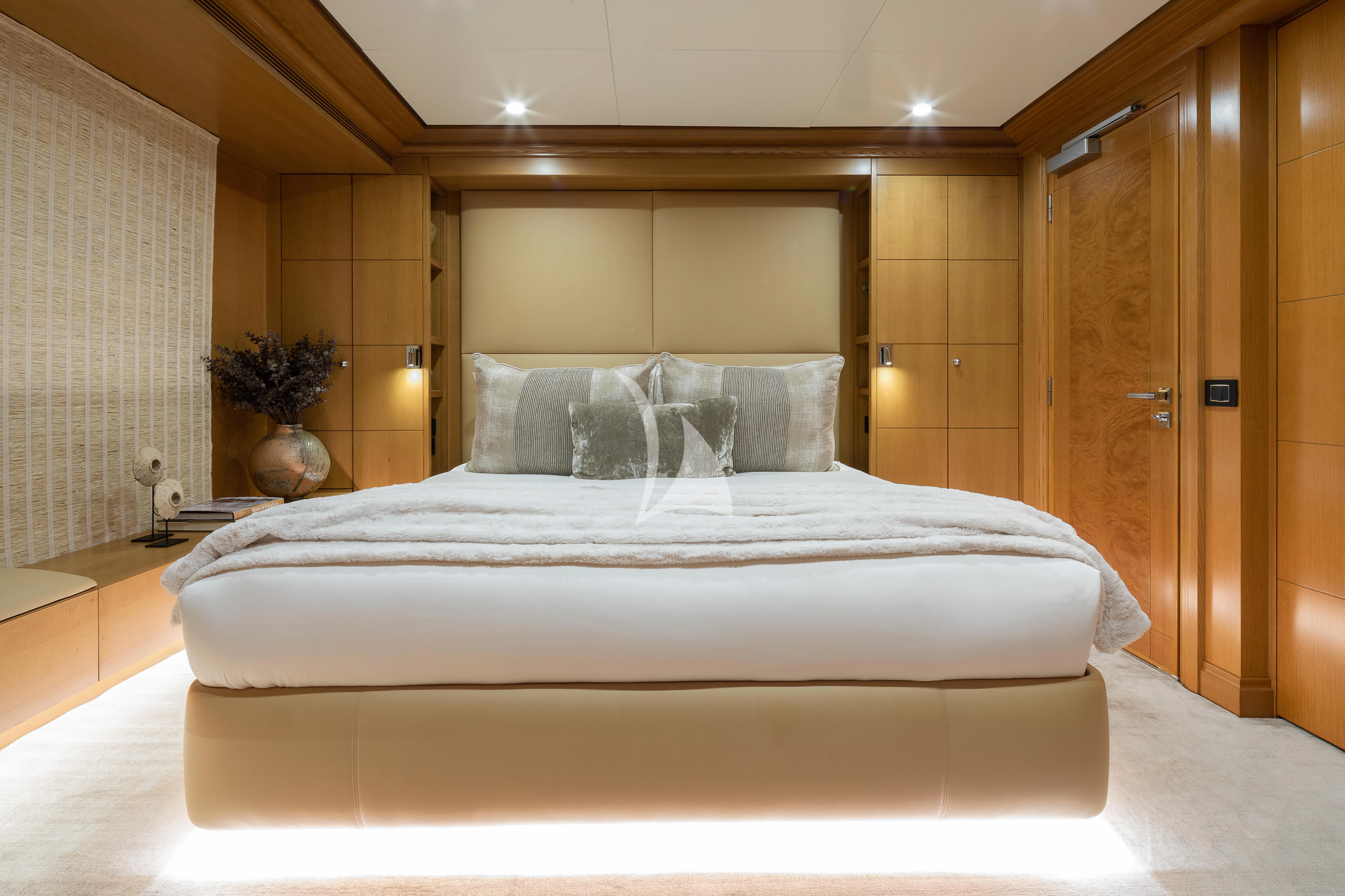 a bed in a room aboard TREEHOUSE Yacht for Sale