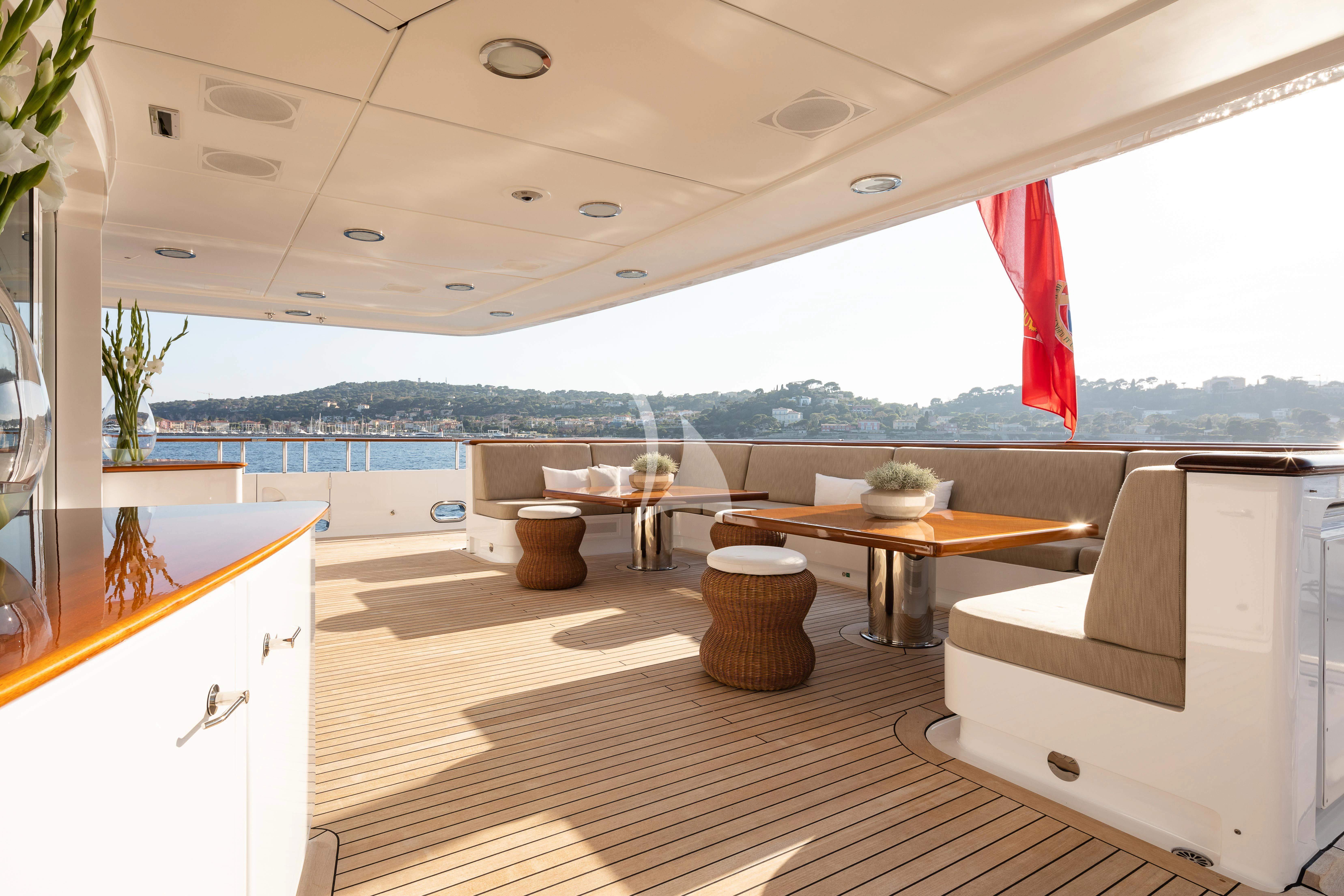 a room with a table and chairs aboard TREEHOUSE Yacht for Sale