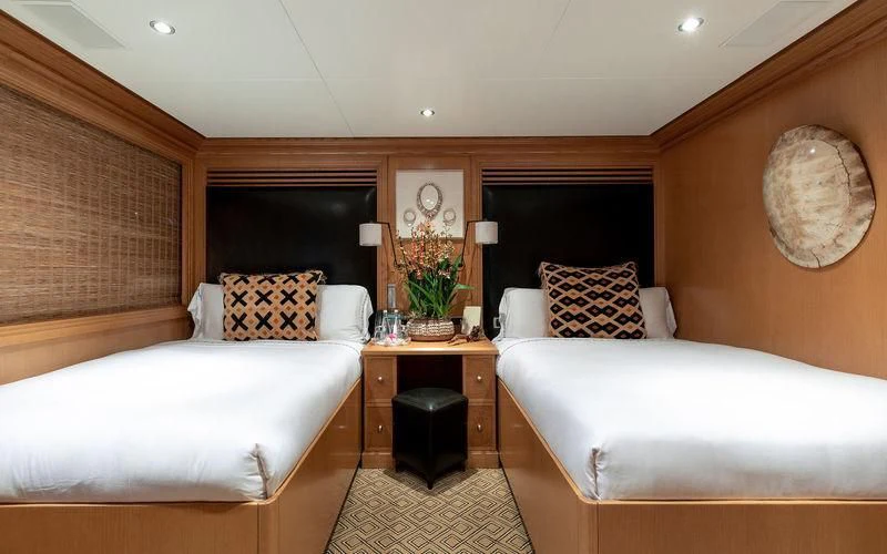 a room with two beds aboard TREEHOUSE Yacht for Sale