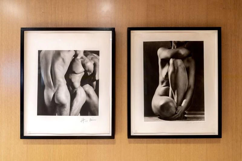 a group of pictures on a wood surface aboard TREEHOUSE Yacht for Sale