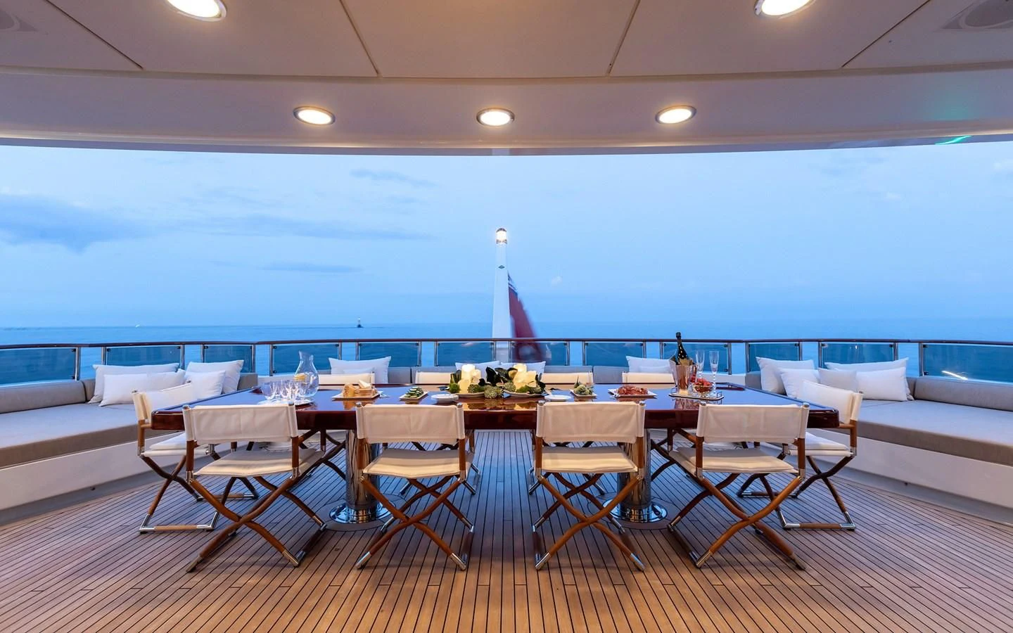 a room with a table and chairs aboard TREEHOUSE Yacht for Sale