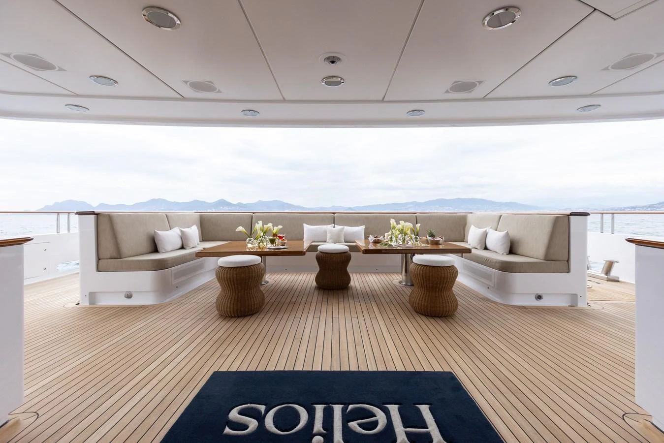 a living room with a couch and a table aboard TREEHOUSE Yacht for Sale