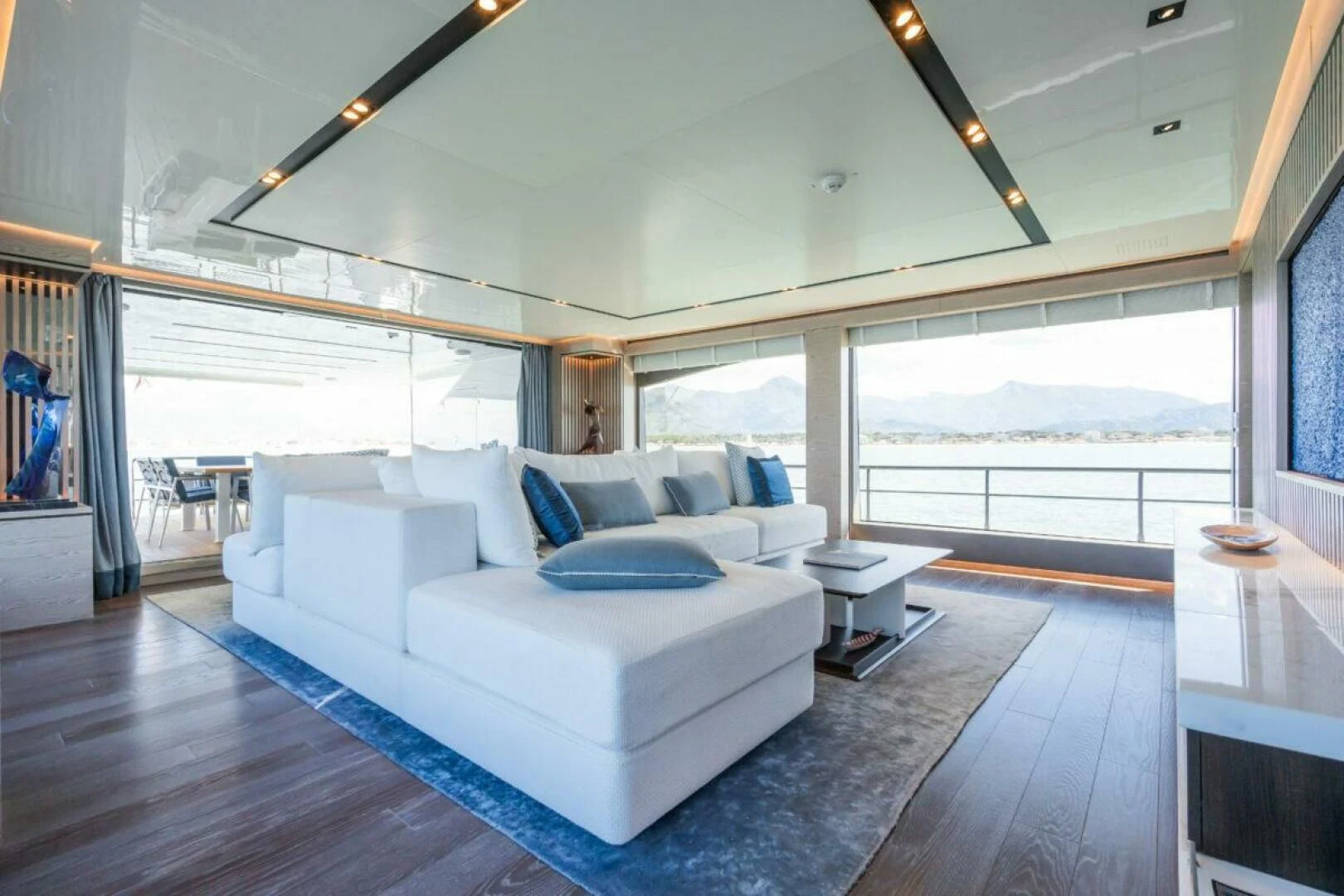 a living room with a large window aboard ZOUT Yacht for Sale