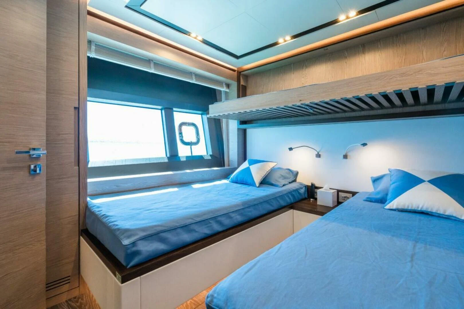 a room with two beds aboard ZOUT Yacht for Sale