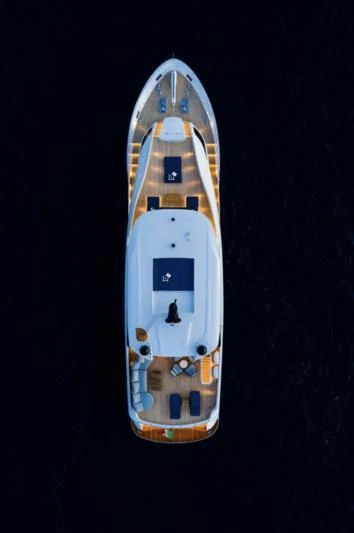 a white and gold watch aboard ZOUT Yacht for Sale