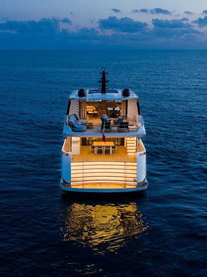 a yellow and white boat in the water aboard ZOUT Yacht for Sale