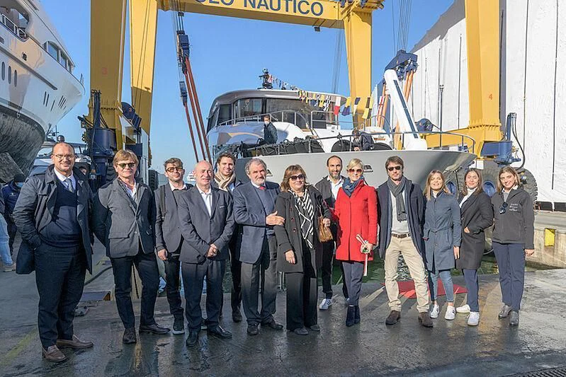 a group of people posing for a photo aboard ZOUT Yacht for Sale