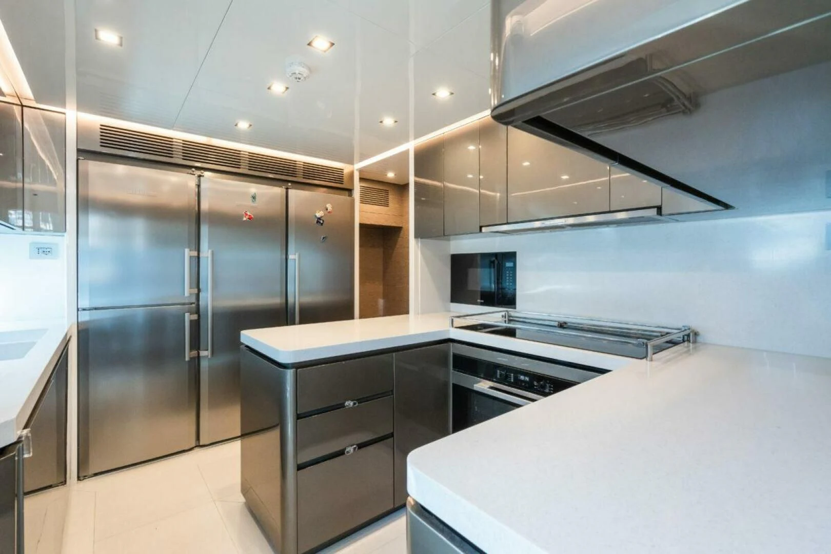 a kitchen with stainless steel appliances aboard ZOUT Yacht for Sale