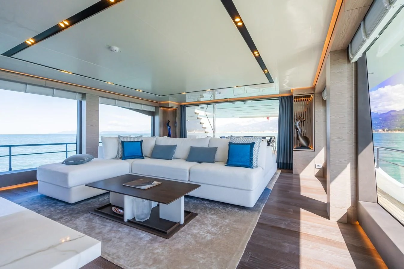 a living room with a large window aboard ZOUT Yacht for Sale
