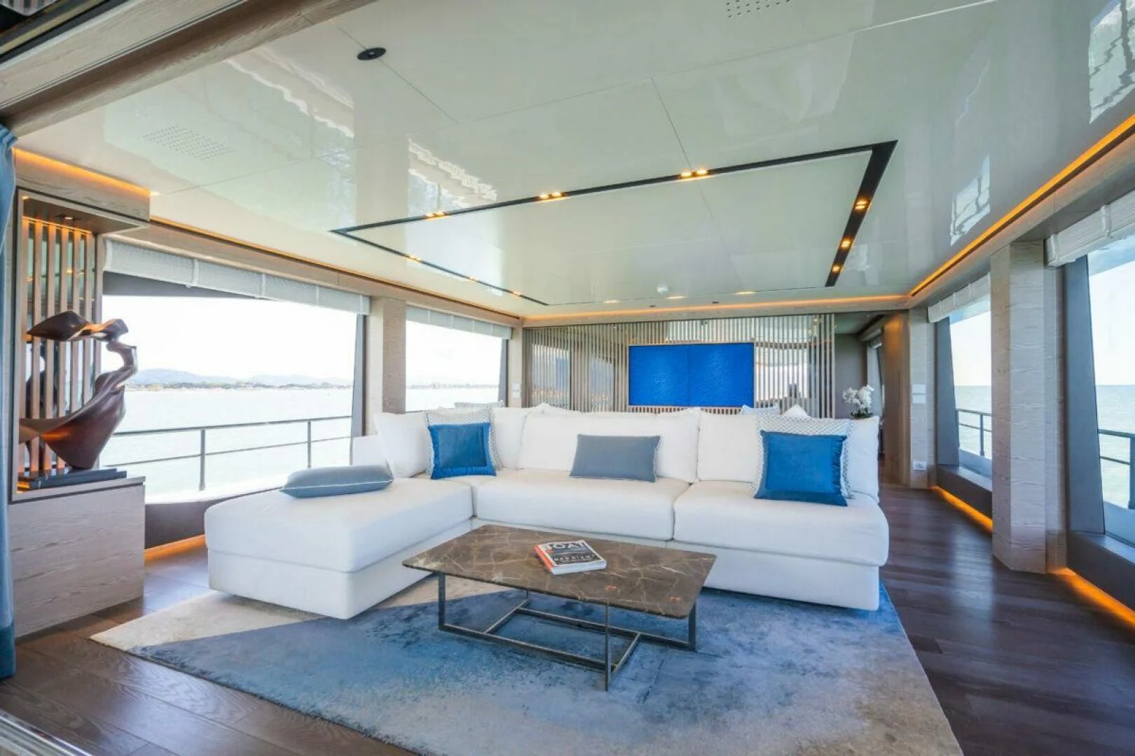 a living room with a large window aboard ZOUT Yacht for Sale