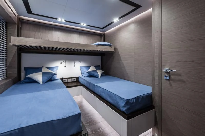 a room with two beds aboard ZOUT Yacht for Sale