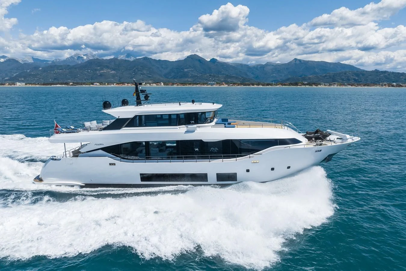 a white yacht on water aboard ZOUT Yacht for Sale