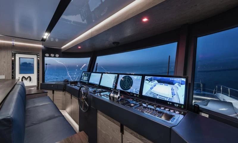 a room with many monitors aboard ZOUT Yacht for Sale
