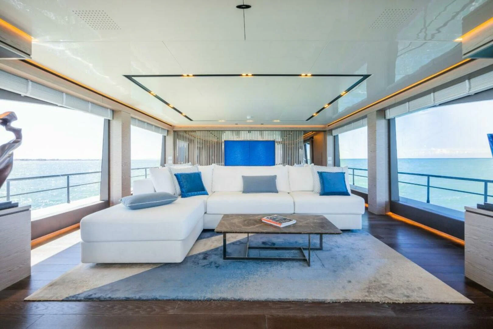 a living room with a large window aboard ZOUT Yacht for Sale