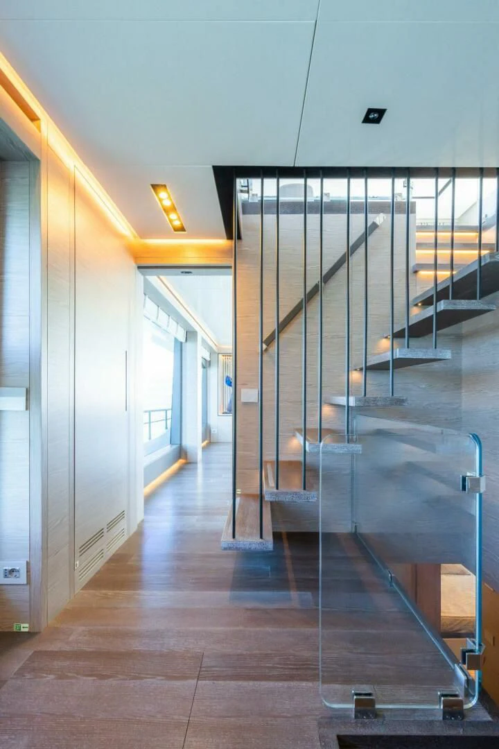 a hallway with glass doors aboard ZOUT Yacht for Sale