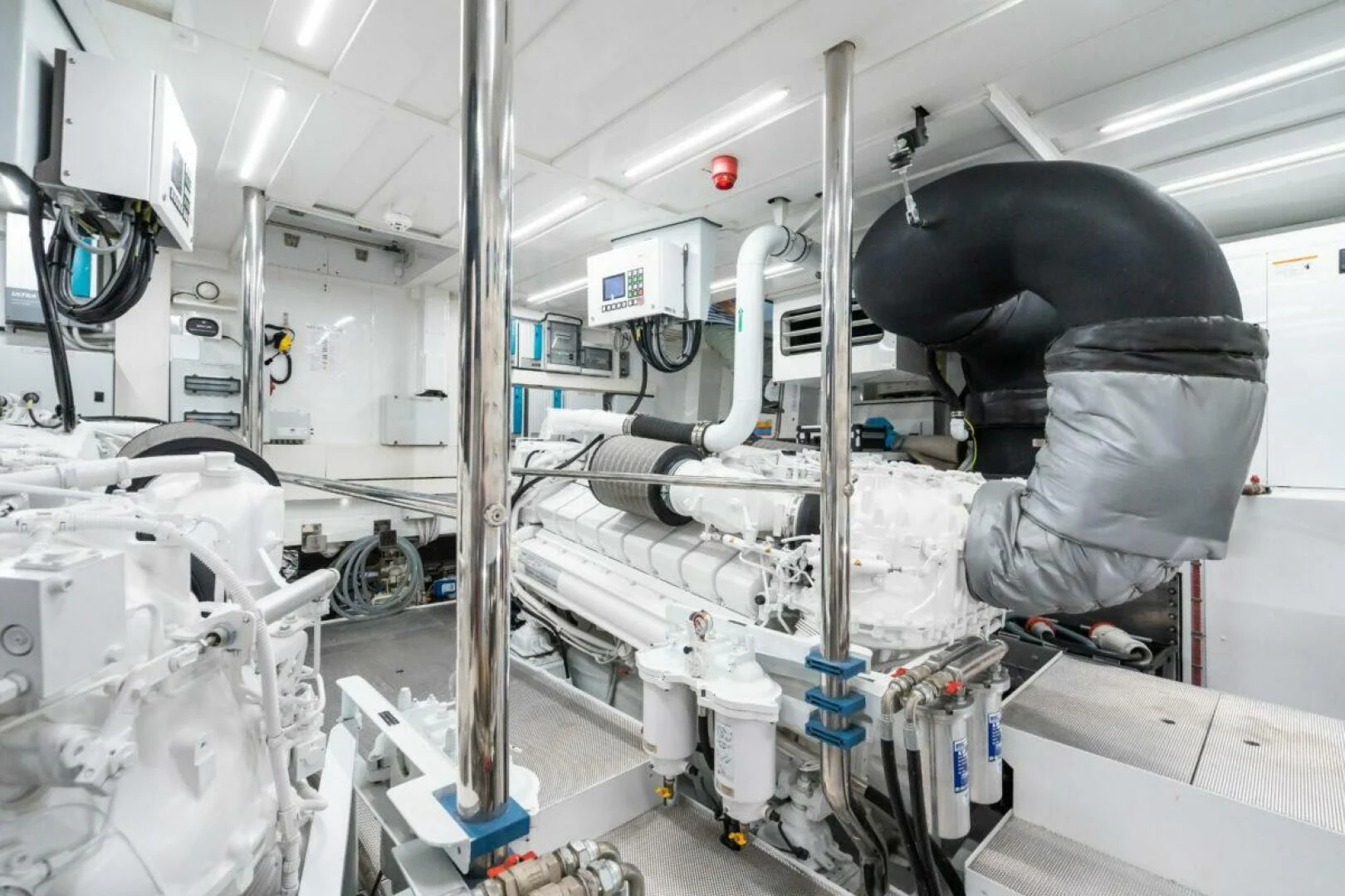 a person in a room with white machines aboard ZOUT Yacht for Sale