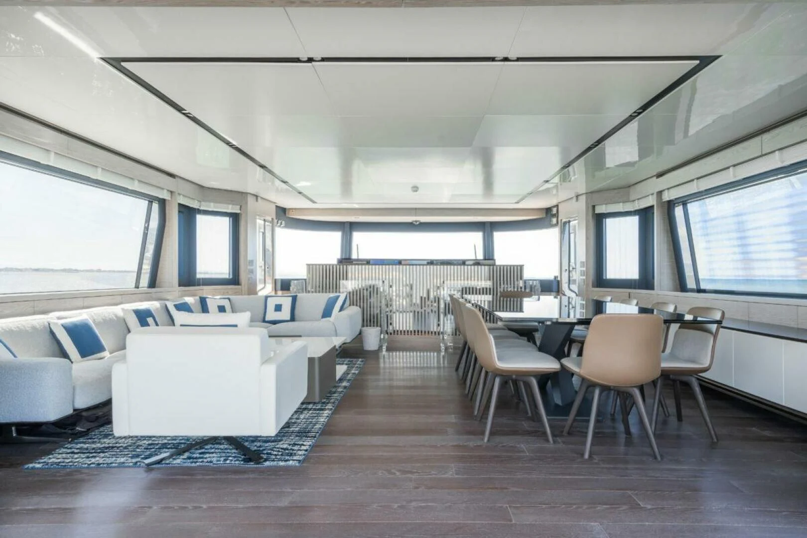a living room with a couch and chairs aboard ZOUT Yacht for Sale