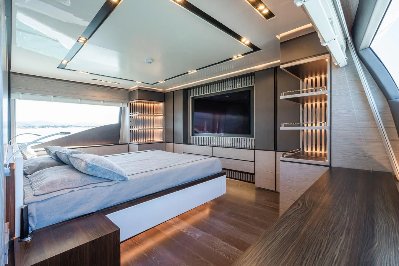 a bedroom with a large bed aboard ZOUT Yacht for Sale