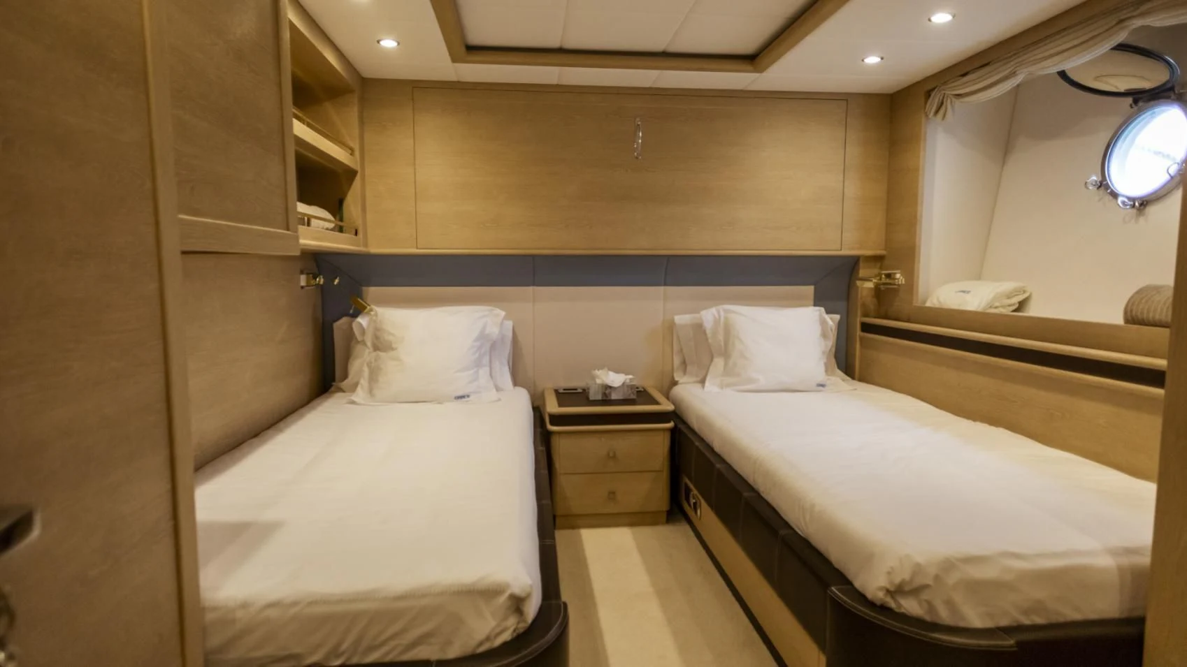 a room with two beds aboard ASTERI Yacht for Sale