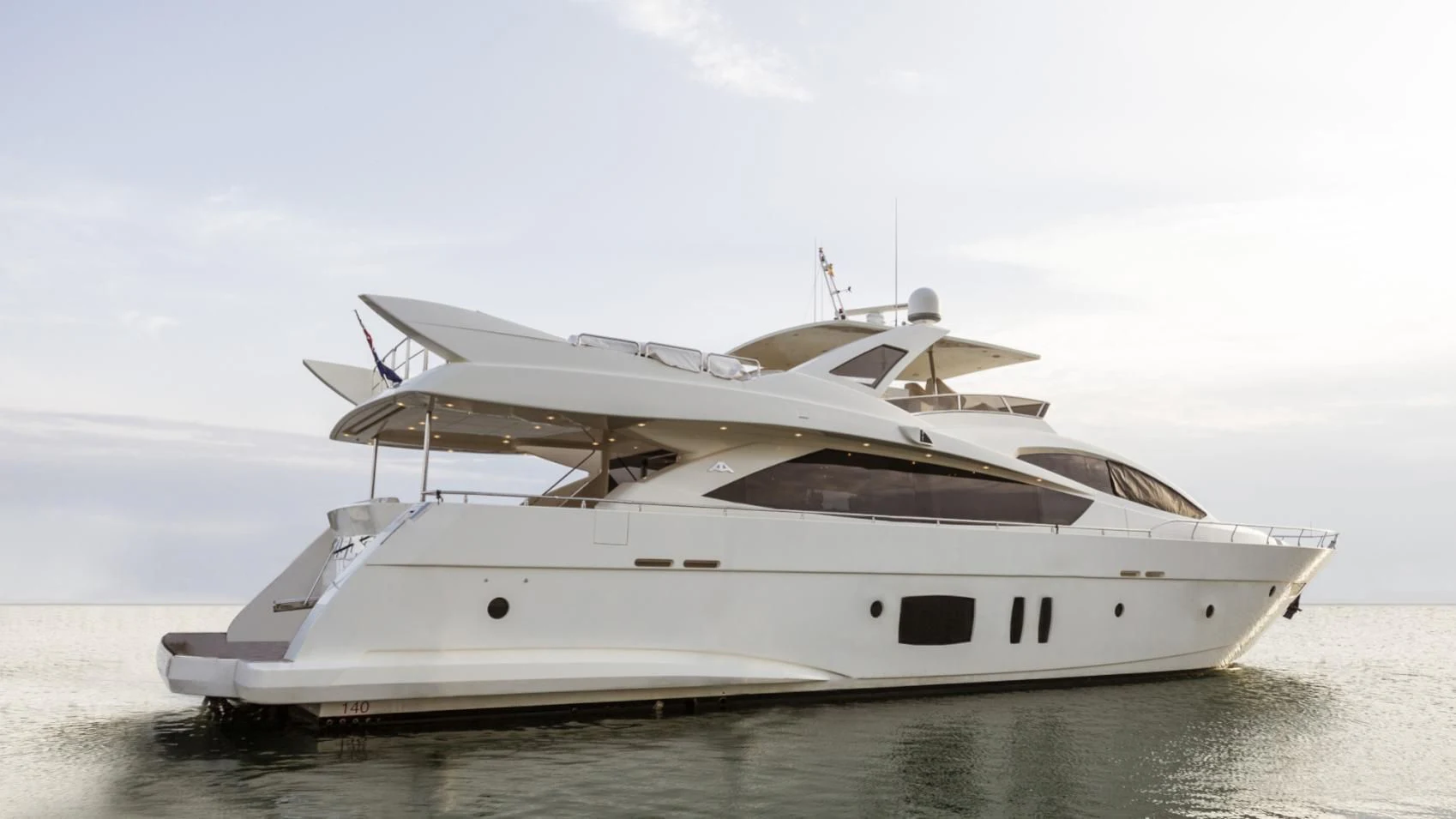 a white yacht in the water aboard ASTERI Yacht for Sale