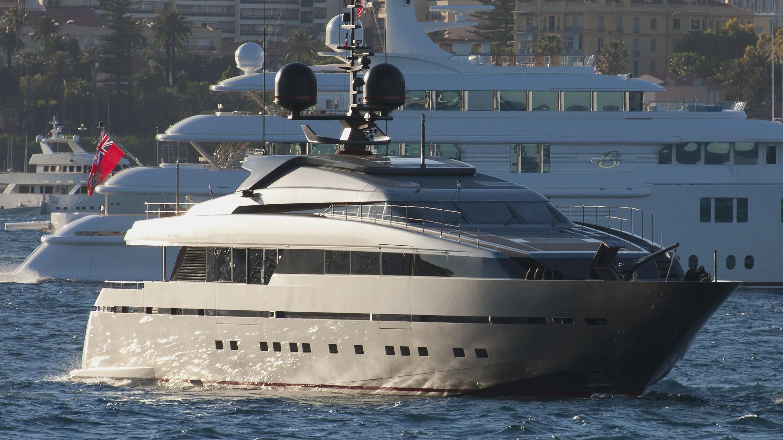 a large white boat with a flag on it aboard ASTERI Yacht for Sale
