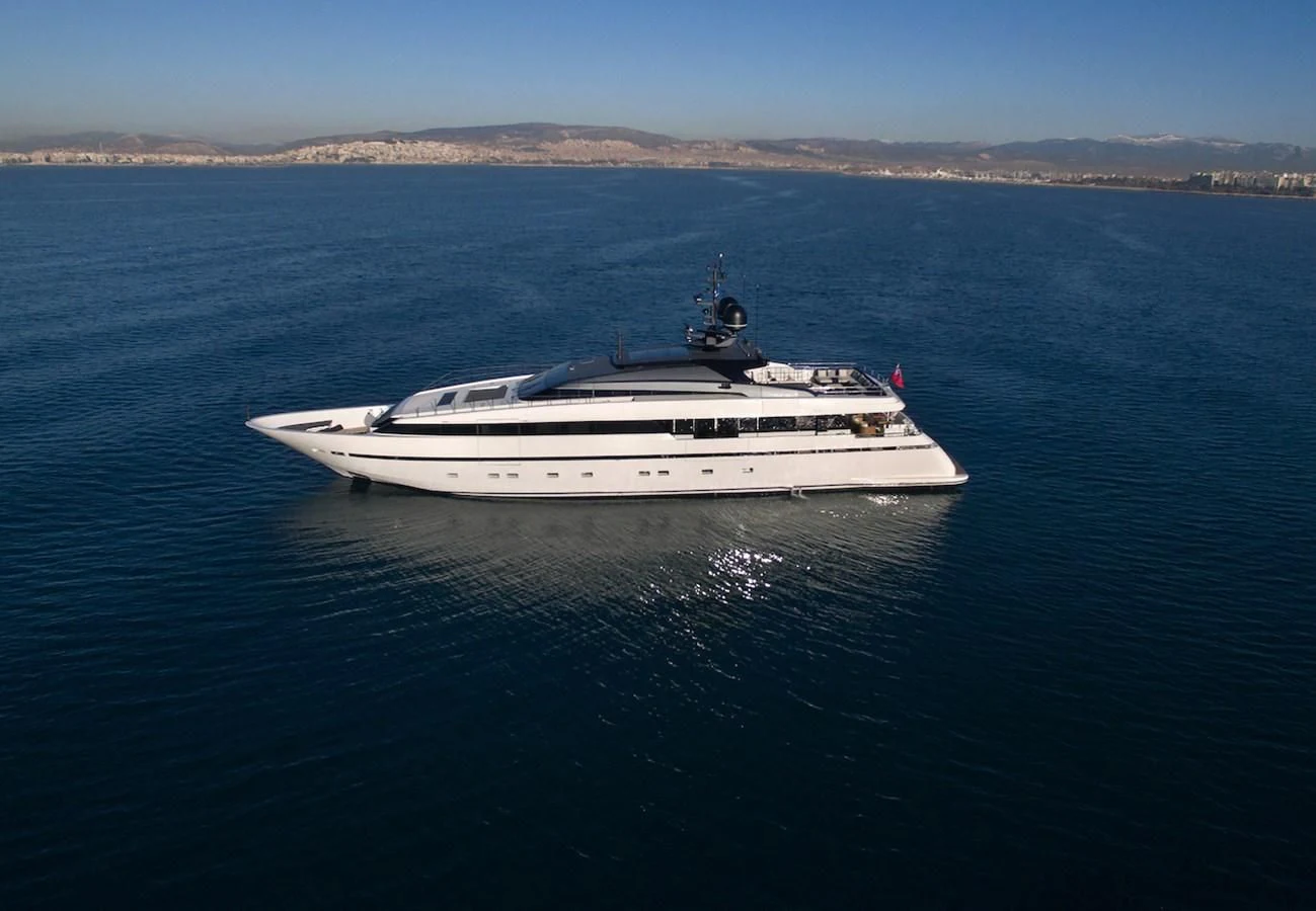 a white boat in the water aboard ASTERI Yacht for Sale