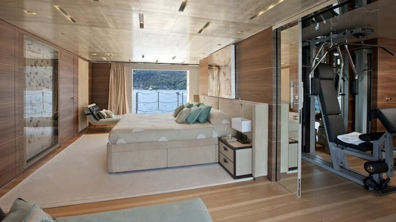 a room with a bed and a window aboard ASTERI Yacht for Sale