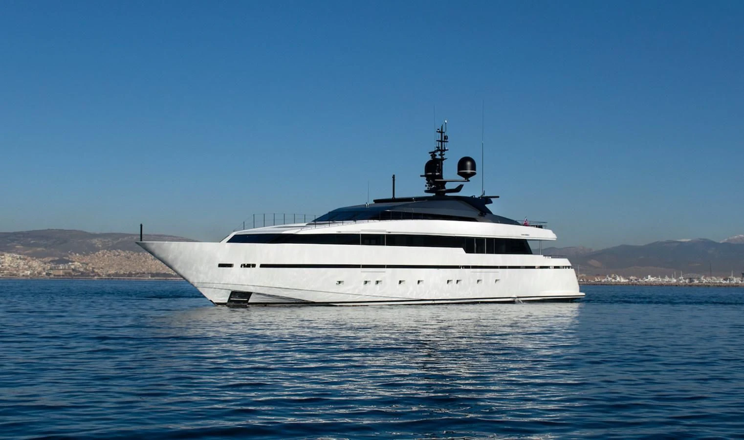 a white boat in the water aboard ASTERI Yacht for Sale