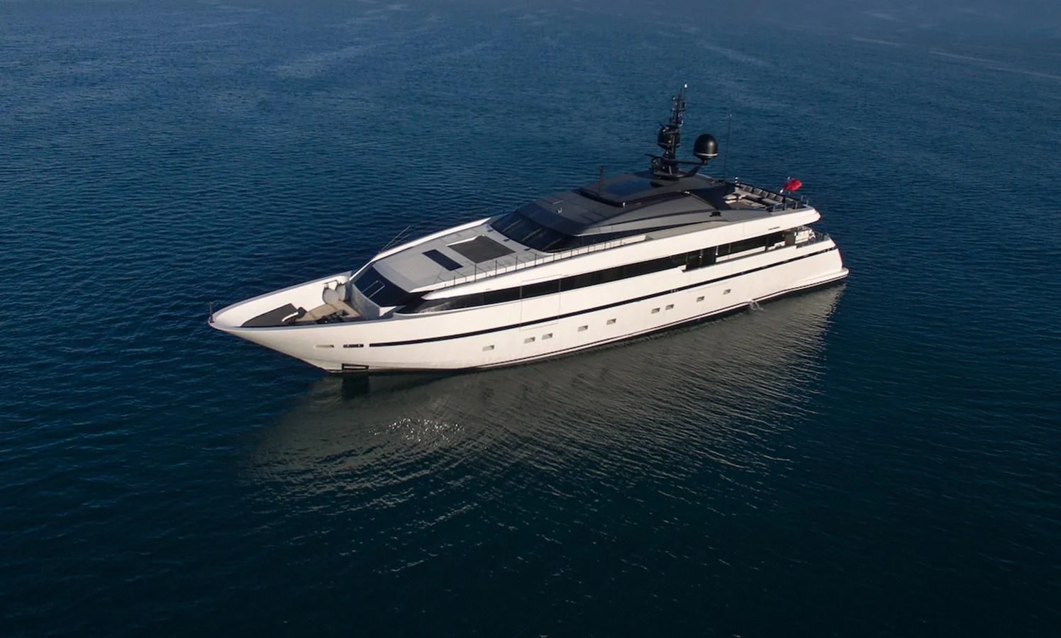 a white yacht in the water aboard ASTERI Yacht for Sale