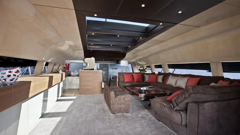 a room with couches and a table aboard ASTERI Yacht for Sale