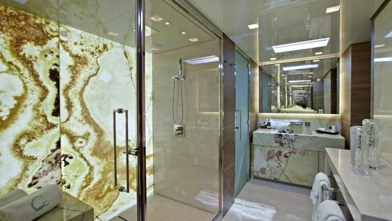 a bathroom with a large mirror aboard ASTERI Yacht for Sale
