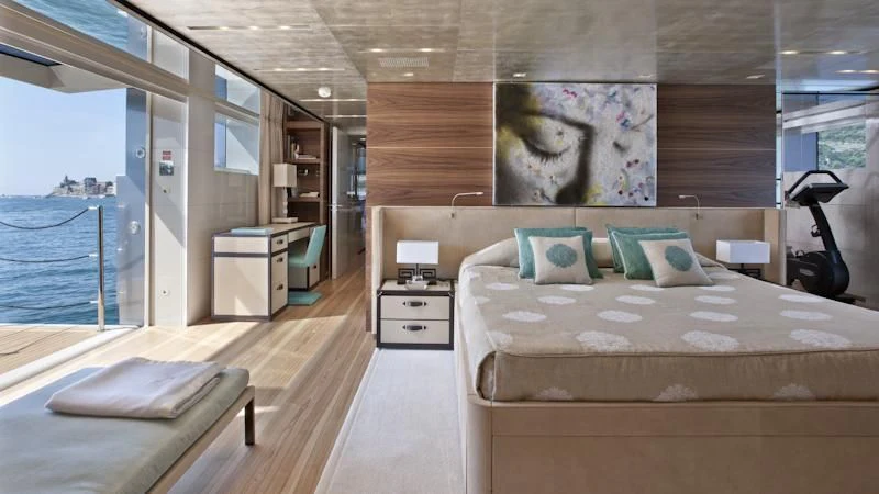 a room with a bed and a desk aboard ASTERI Yacht for Sale