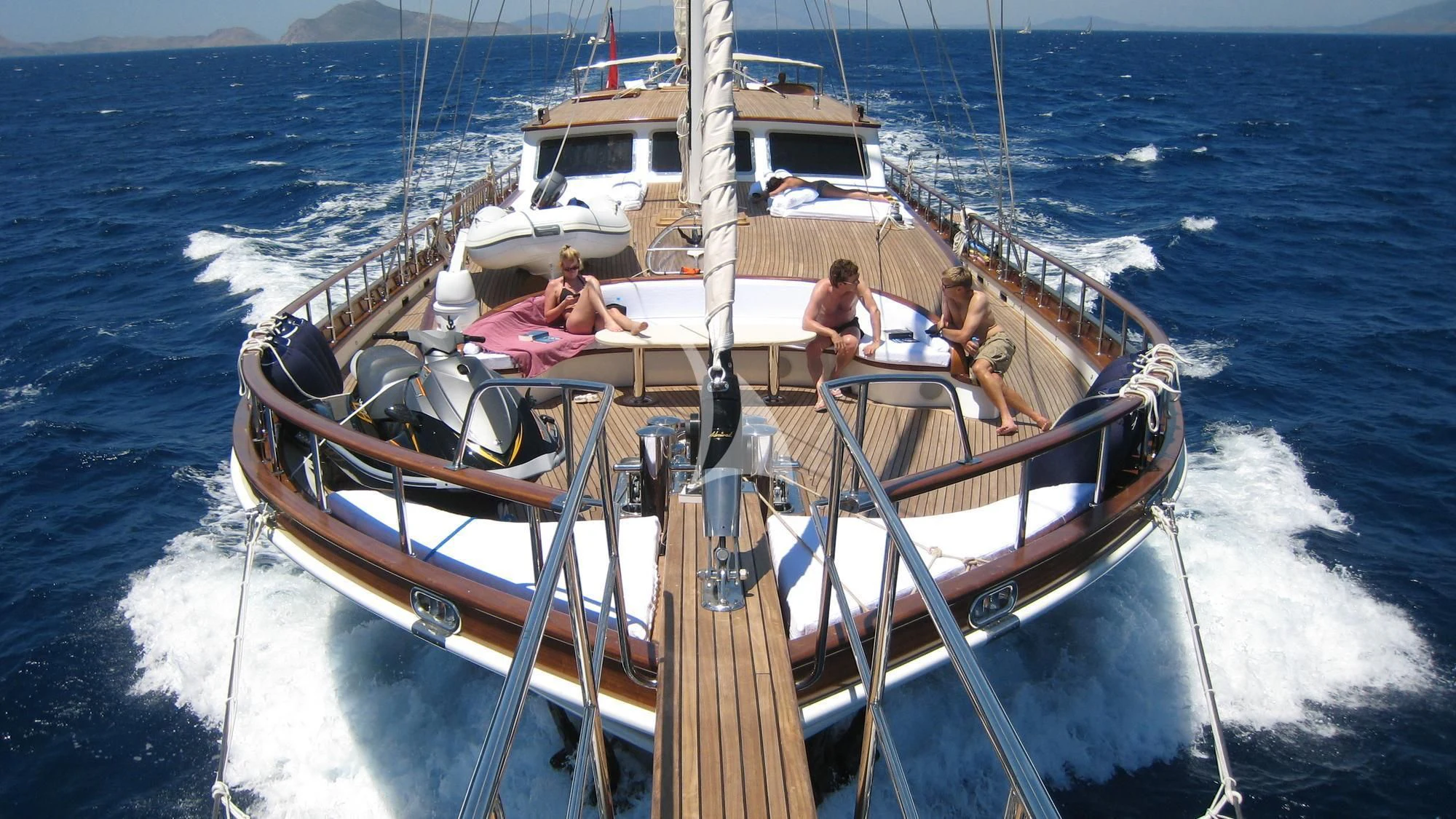 a group of people on a boat aboard KAYA GUNERI V Yacht for Sale