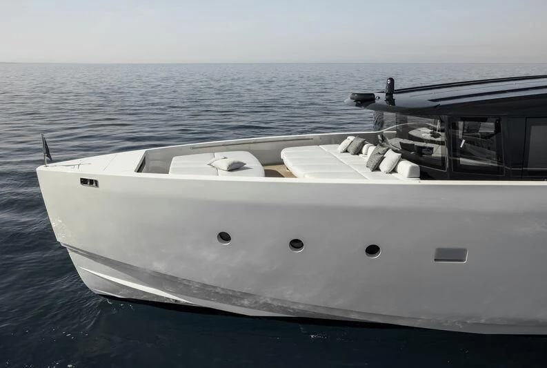 a white boat on the water aboard STEEL IT Yacht for Sale