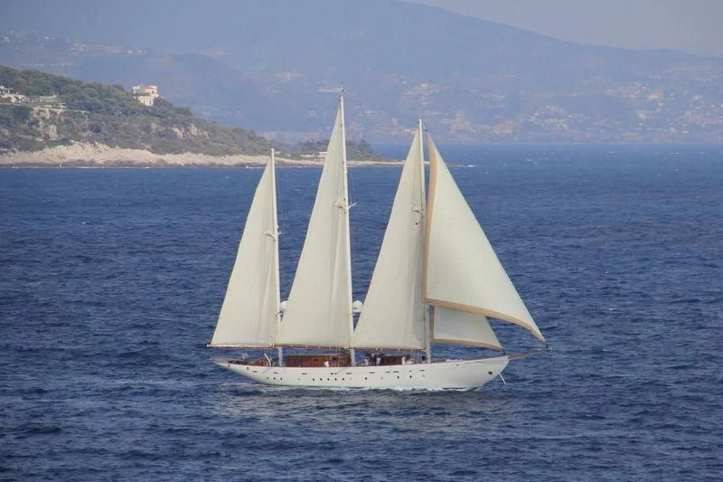 a sailboat on the water aboard XARIFA 1927 Yacht for Sale