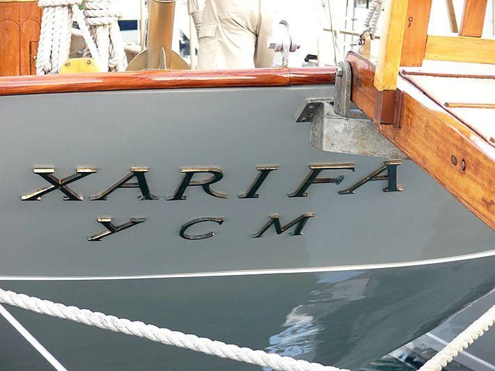 a boat with a word on it aboard XARIFA 1927 Yacht for Sale