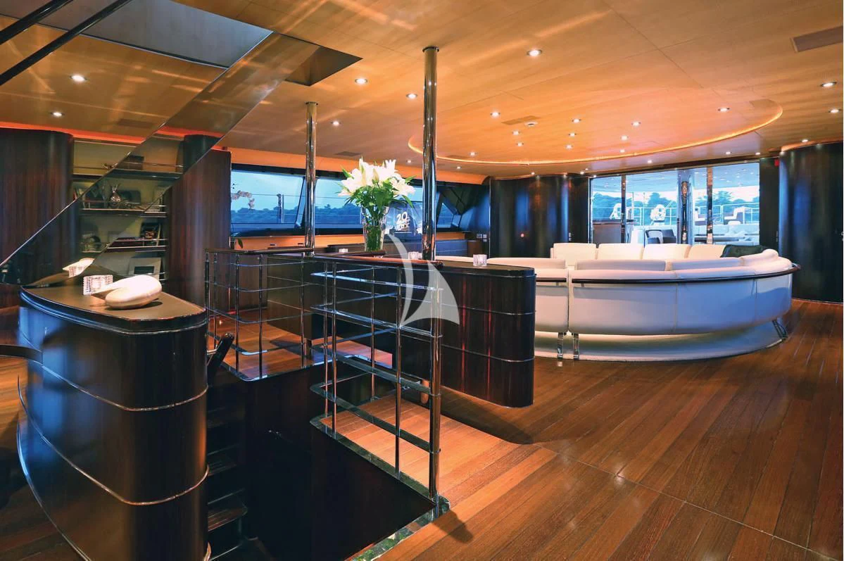 a large room with a large table and chairs aboard PARSIFAL III Yacht for Charter