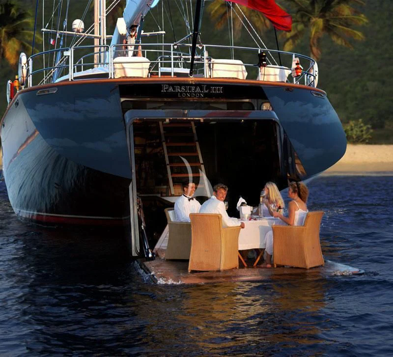 a boat with people sitting on it aboard PARSIFAL III Yacht for Charter