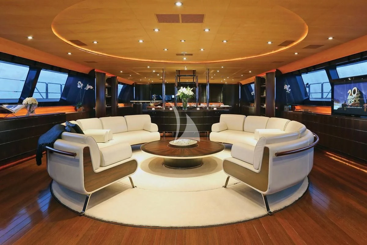 a room with a table and chairs aboard PARSIFAL III Yacht for Charter