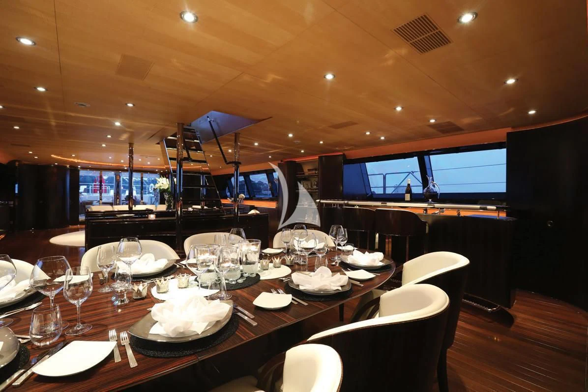 a table set for a dinner aboard PARSIFAL III Yacht for Charter