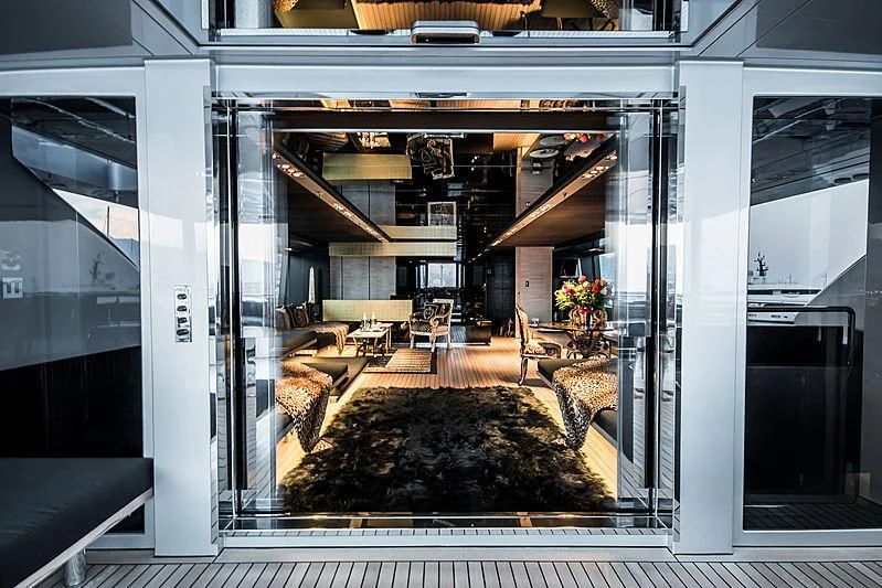a large room with a large rug aboard MY FAIR LADY Yacht for Sale