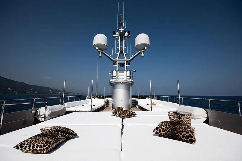 a white table with a light bulb on it and a rug on it aboard MY FAIR LADY Yacht for Sale