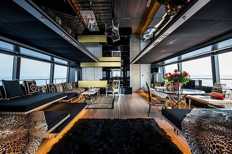 a living room with a large window aboard MY FAIR LADY Yacht for Sale
